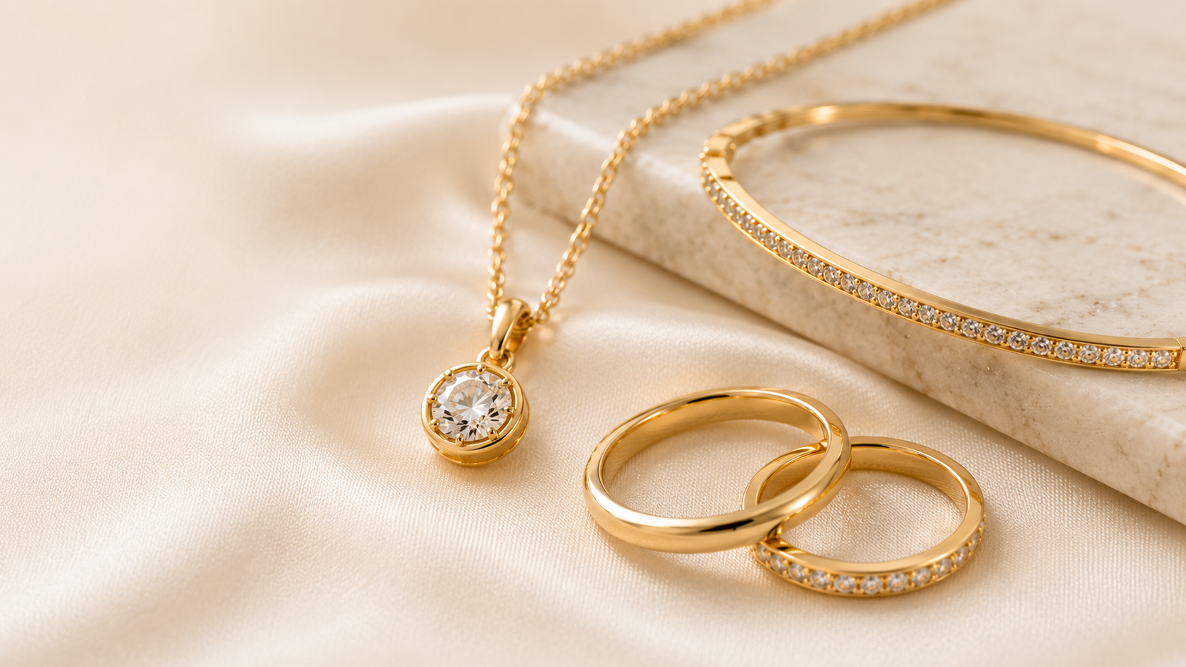 Gold jewelry on marble